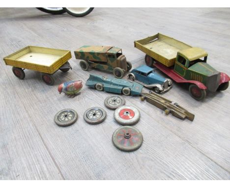 Assorted playworn clock work tinplate vehicles including Minic Saloon car, English made tipping truck and trailer etc togethe