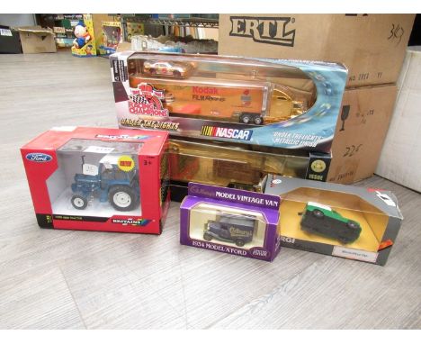 A boxed diecast Britains 42794 Ford 6600 Tractor, Corgi Classics Morris Minor Van, two Nascar lorries and a Lledo Model 'A' F
