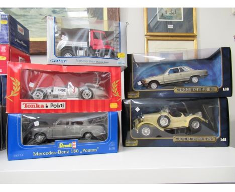 Five assorted 1:18 scale diecast vehicles to include Ricko Mercedes-Benz 630K (1927) and Mercedes-Benz 500 SLC (1981), Revell