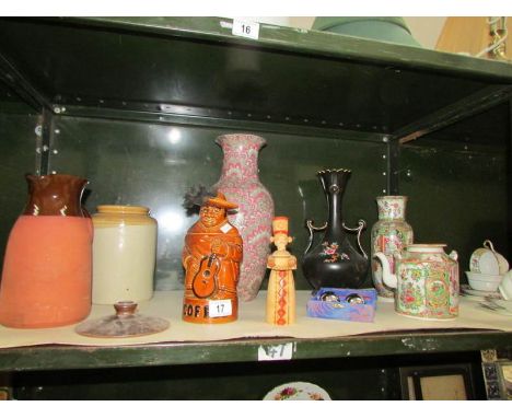 A shelf of miscellaneous including oriental