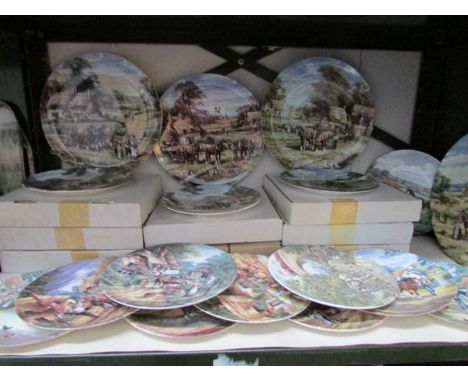 A shelf of collector's plates