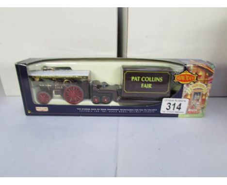A boxed Days Gone Pat Collins fair traction engine with trailer