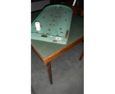 A card table and a bagatelle