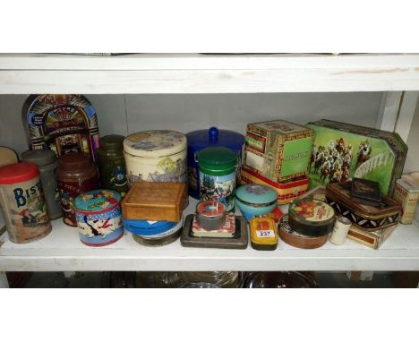 A shelf of old tins etc