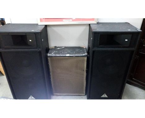 A pair of professional Behringer speakers with top horns and a speaker cabinet