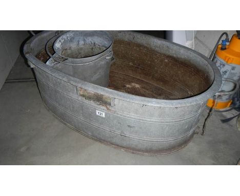 A large metal trough and other items