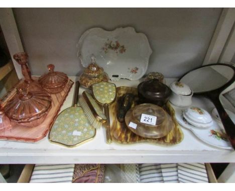 A shelf of assorted trinket ware