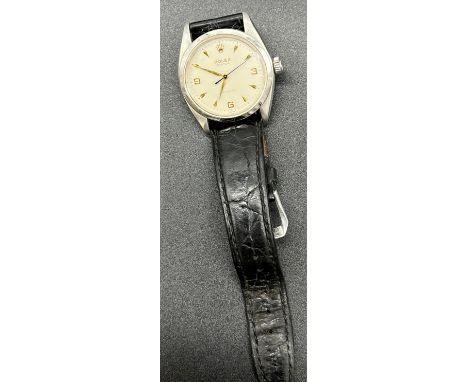 A 1960's Vintage Gent's Rolex Oyster Precision wrist watch. Engraved to back plate. In a working condition. 