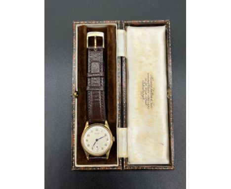 A vintage 9ct gold cased gent's wrist watch. Movement by Tatton Edinburgh- 15 jewels. In a working condition. 