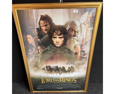 A Vintage framed Lord of the Rings poster signed by Cate Blanchett, Elijah Wood, Sean Austin, Ian McKellen and Liv Tyler. [10