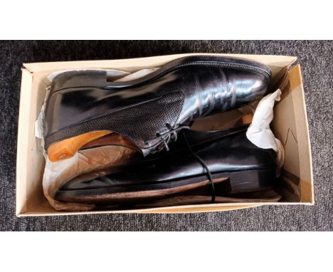 A Pair of vintage 'Church's famous English shoes' Gent's leather shoes. Size 7.5. Comes with box. 