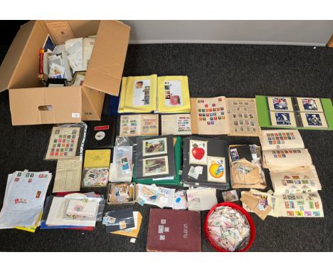 A Large quantity of loose stamps, albums and first day covers. 