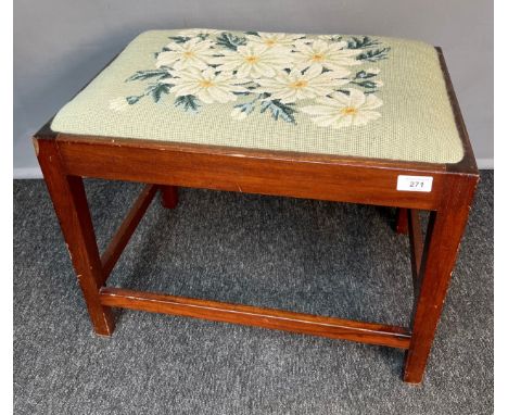 Antique mahogany framed stool, the cushioned seat covered with floral tapestry, supported with peripheral stretchers and rais