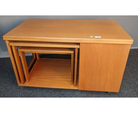 McIntosh tristor table, the rectangular swivel top opening to a larger surface area with interior storage above two pull-out 