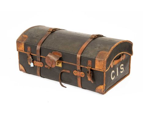 A canvas and leather domed top trunk, initialled CIS, on castors, 100cm wide, 57cm deep, 45cm high, a mahogany and brass boun