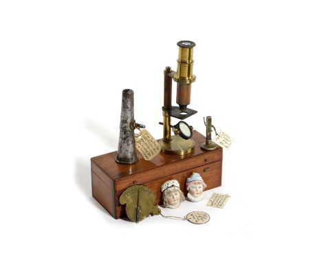 A BRASS VERTICAL SUNDIAL INSCRIBED F. ZAPPECK, 19TH CENTURY with a folding gnomon and month pointer; together with a cased br