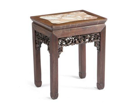 A CHINESE HARDWOOD LOW STAND LATE 19TH CENTURY the top inset with a marble panel, the pierced and carved frieze decorated wit