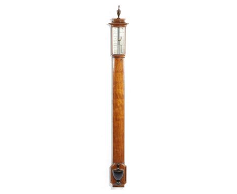 A GEORGE III SATINWOOD BOWFRONT STICK BAROMETER C.1800 the silvered gauge inscribed 'Wilson &amp; Dixey' beneath a painted ur