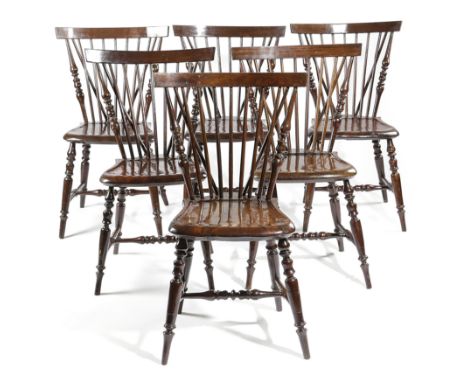 A SET OF SIX MAHOGANY WINDSOR STYLE SIDE CHAIRS POSSIBLY AMERICAN, SECOND HALF 19TH CENTURY each with a comb top rail, above 