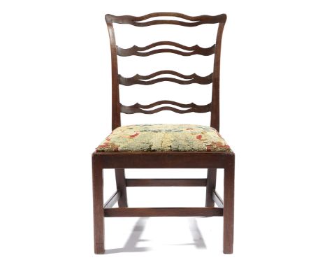 AN EARLY GEORGE III MAHOGANY SIDE CHAIR C.1770 with a pierced ladder back, above a tapestry drop-in seat, on chamfered front 