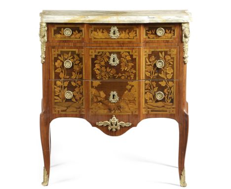 A FRENCH KINGWOOD AND MARQUETRY COMMODE IN TRANSITIONAL STYLE 18TH CENTURY with ormolu mounts and inlaid with panels of flowe