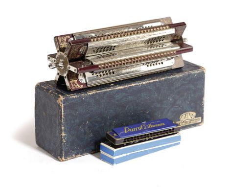 A HOHNER SIX-WAY PADDLE WHEEL EXTRA FEINE HARMONICA with its original box; together with a 'Parrot Harmonica' (2) length 27.5