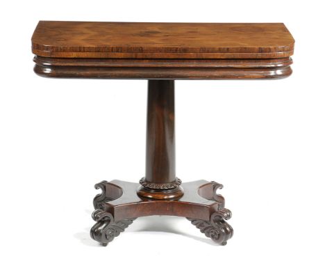 λ AN EARLY VICTORIAN ROSEWOOD CARD TABLE C.1840 with a hinged swivel top, revealing a baize lined playing surface, with a pla