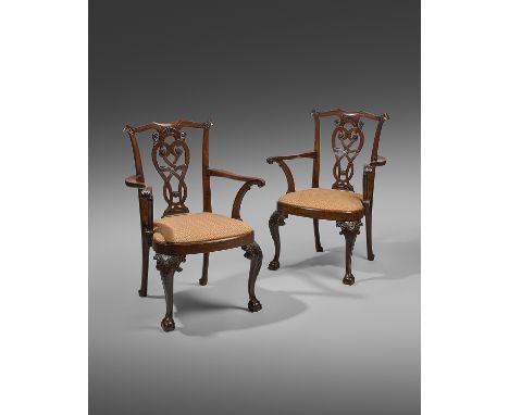 A RARE PAIR OF ANGLO-CHINESE EXPORT PADOUK ARMCHAIRS IN IRISH STYLE, MID-18TH CENTURY each with a scroll top rail above a pie