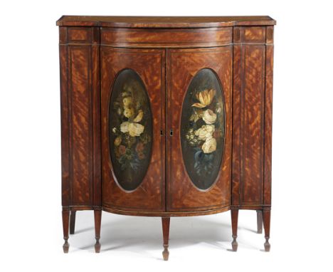 A GEORGE III SATINWOOD COMMODE SHERATON PERIOD, C.1790 inlaid with stringing and purple heart panels, with a pair of bowfront