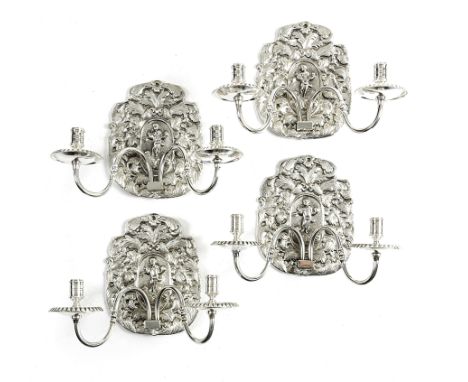 A SET OF FOUR SILVERED TWIN-LIGHT WALL LIGHTS IN 17TH CENTURY STYLE the wall plates cast with a central figure, possibly Venu