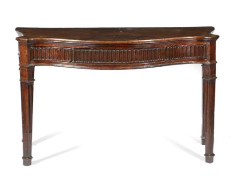 A GEORGE III MAHOGANY SERPENTINE SERVING TABLE C.1790 inlaid with stringing, the fan inlaid top with a central oval panel, ab