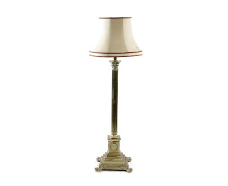 A BRASS CORINTHIAN COLUMN STANDARD LAMP with an adjustable stem 137cm high, 39cm wide Provenance Wellow Manor, Hampshire 