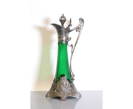 An Art Nouveau WMF claret jug and stopper,of slender tapering form, silver-plated and green glass, with a handle and mounts c