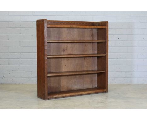 A Robert 'Mouseman' Thompson oak open bookcase,  with a raised three-quarter gallery with half-penny moulding, over three adj