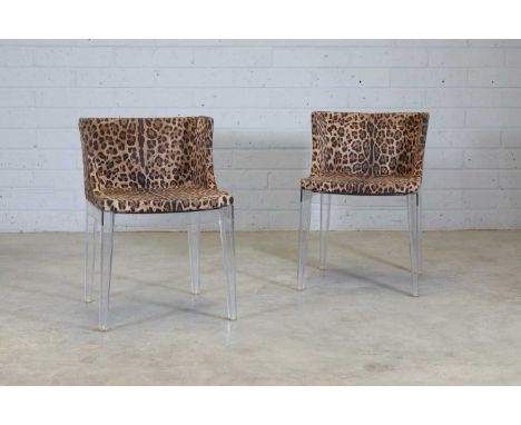 A pair of 'Mademoiselle' chairs,  designed by Dolce &amp; Gabbana for Kartell, each with a faux leopard print seat, raised on