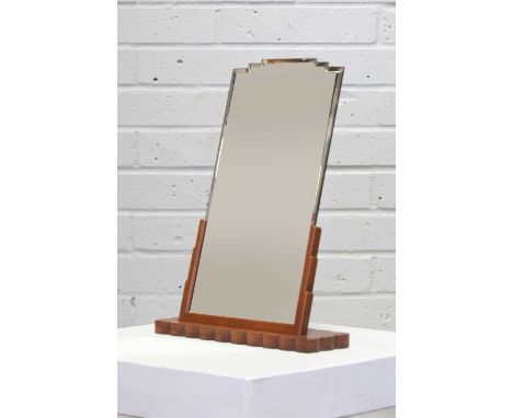 A satin oak Art Deco table mirror,1930s, designed by Betty Joel for Token Works, the waterfall mirror plate within stepped su