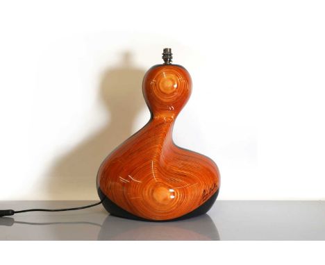 A carved and lacquered table lamp, by Christian Wallis, of abstract form, signed, 50cm high     Condition ReportPAT test 26.1