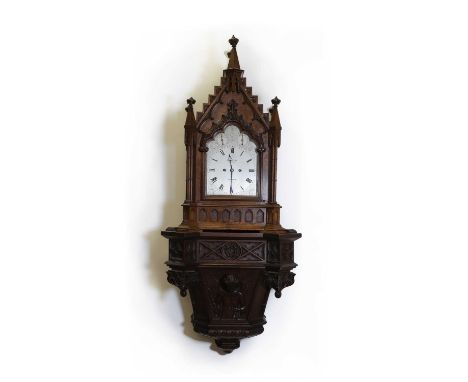 A Gothic oak bracket clock,c.1870, by C Lupton, Cornhill, the arched silvered dial with strike/silent and slow/fast dials, en