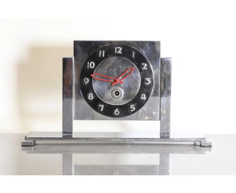 An Art Deco silvered-bronze mantel clock,  dated 1939, with a black-enamelled chapter ring, with pierced hands, signed and da