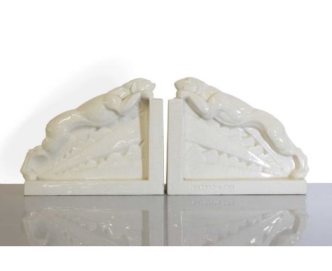 A pair of French Art Deco ceramic bookends,  designed by Lemenceau, each modelled as a panther, signed and stamped marks 'St 