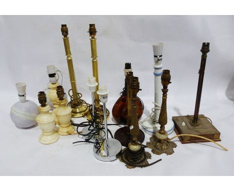 Assorted table lamps to include a pair of alabaster, ceramics, a glass Armagnac Napoleon Brandy turned into an electric&nbsp;