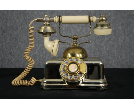 A reproduction vintage telephone (Wired for use). H.21cm. 