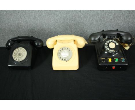 Three vintage telephones. H.16 W.15 D.24cm. (largest). 