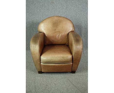 Armchair, contemporary vintage style in tan leather. H.92 W.86 D.80cm. 