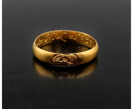 A High Grade Gold Memento Mori Finger Ring, dated 1692. The ring has a ‘D’ shaped cross section with a flat interior with int