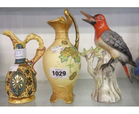 A small Zsolnay Pecs ewer with reticulation and panel decoration - sold with an Ernst Wahliss Vienna ewer with tube lined flo