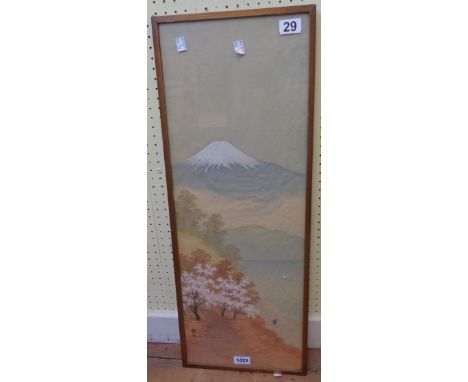 A gilt framed Japanese silk painting, depicting a view of Mount Fuji with figure and flowering trees in foreground - signed -