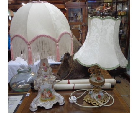 A continental porcelain table lamp decorated with transfer printed panels in the Rococo manner - sold with a gilt metal porce