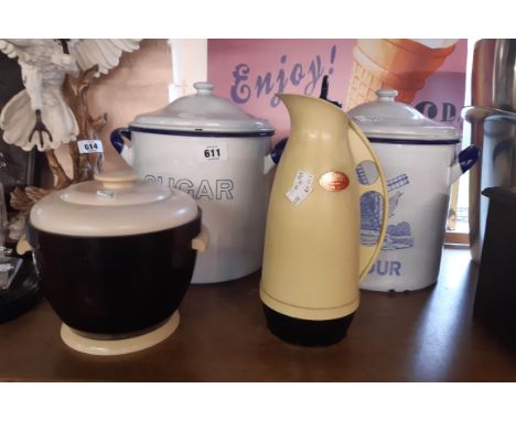 A vintage enamel flour bin with stenciled windmill decoration, a similar sugar container - sold with a Thermos Bakelite Ice B