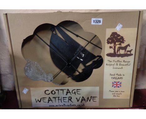 An Animal Brackets Cottage range yacht pattern weather vane in original box